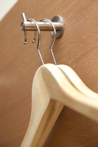 a close up of a urinal on a wall at McDreams Hotel Mönchengladbach in Mönchengladbach