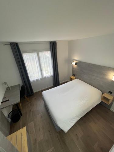 Postel nebo postele na pokoji v ubytování Hotel Castel