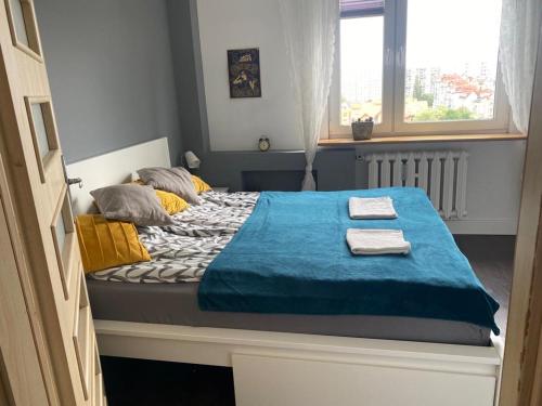 Krevet ili kreveti u jedinici u objektu Kołobrzeg Nad Bałtykiem apartament