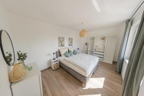 Ένα ή περισσότερα κρεβάτια σε δωμάτιο στο Luxus Apartment Bad Salzuflen