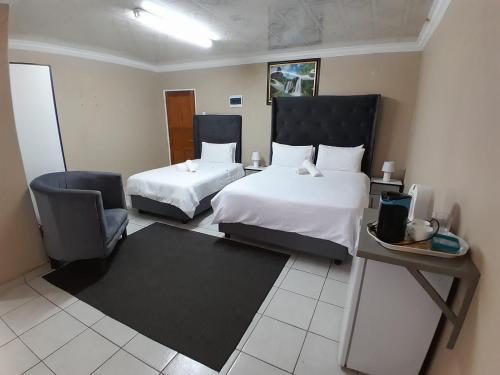 Katil atau katil-katil dalam bilik di Super classic guest house