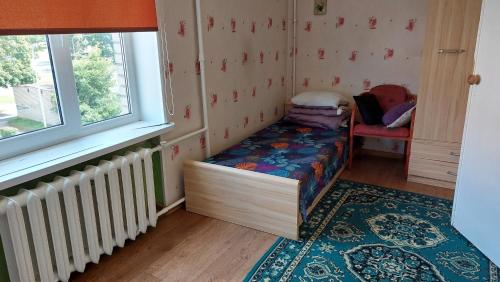 Postel nebo postele na pokoji v ubytování Квартира посуточно в Sillamäe!