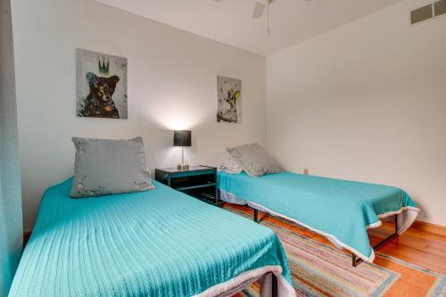 two beds in a room with blue sheets at Pet-Friendly Union Vacation Rental with Pool! in Union