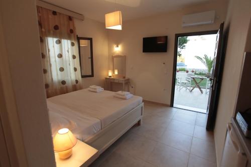 A bed or beds in a room at Asterias