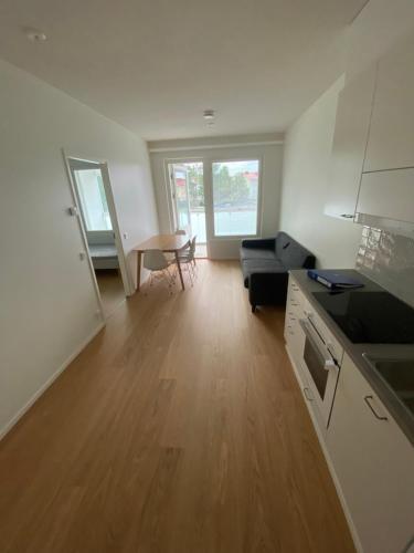 Kuchyň nebo kuchyňský kout v ubytování Scandinavia Apartment Aapo