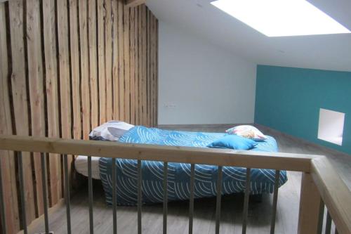 Gîte du charpentier tesisinde bir odada yatak veya yataklar