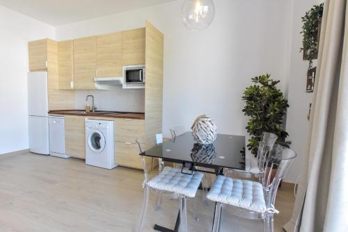 Η κουζίνα ή μικρή κουζίνα στο Apartamentos Gran Vía by SIERRA VIVA