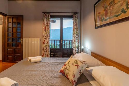 Postel nebo postele na pokoji v ubytování Thalia's Abode