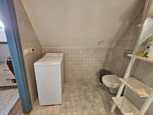 Koupelna v ubytování Home Inn STN17