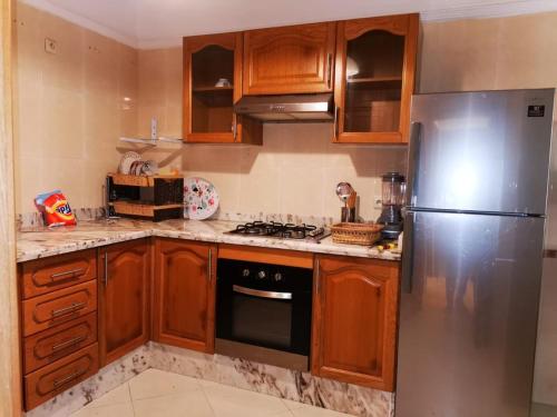 Kuchyň nebo kuchyňský kout v ubytování Apartment familial Tanger