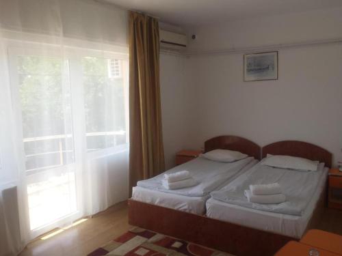 Cama o camas de una habitación en Steffano Costinesti