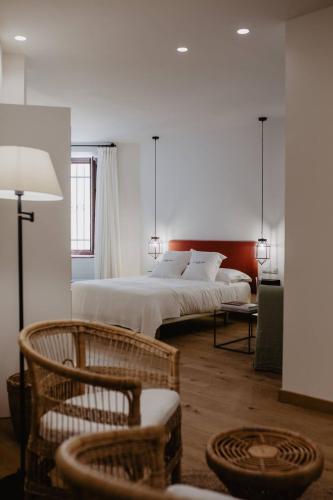 Katil atau katil-katil dalam bilik di La Ermita Suites - Único Hotel Monumento de Córdoba