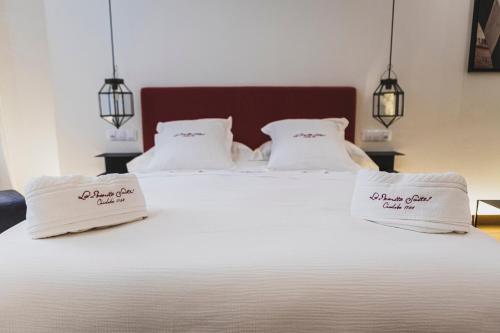 Katil atau katil-katil dalam bilik di La Ermita Suites - Único Hotel Monumento de Córdoba