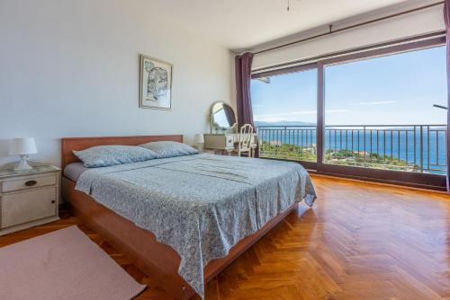 Ένα ή περισσότερα κρεβάτια σε δωμάτιο στο Apartments Aneta