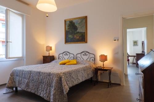 Ένα ή περισσότερα κρεβάτια σε δωμάτιο στο Casa Augusta