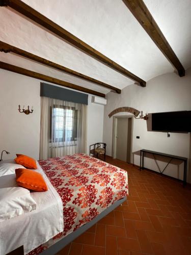 Una cama o camas en una habitación de A.G. Rooms in casa colonica