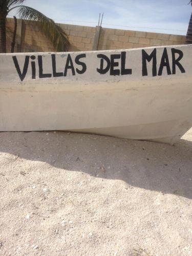 a white boat with the words vilsias del mar on it at Villas Del Mar in Celestún