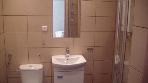 Kúpeľňa v ubytovaní Apartament Kozia I