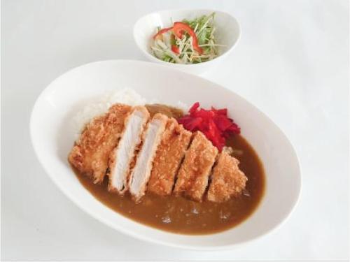 a white plate of food with a bowl of soup at Pension Hinode in Hachimantai
