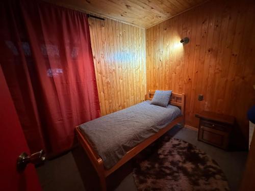 Postel nebo postele na pokoji v ubytování CABAÑA 325 centro de QUELLON