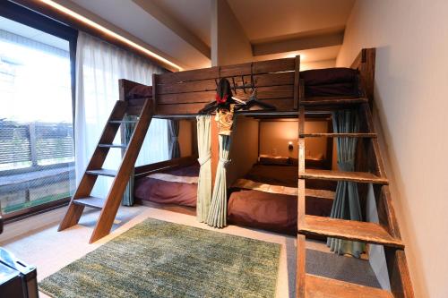 Postel nebo postele na pokoji v ubytování Hotel Tokyo Hub