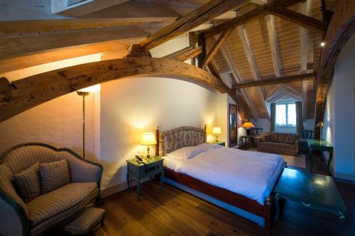 Кровать или кровати в номере Auberge du Raisin