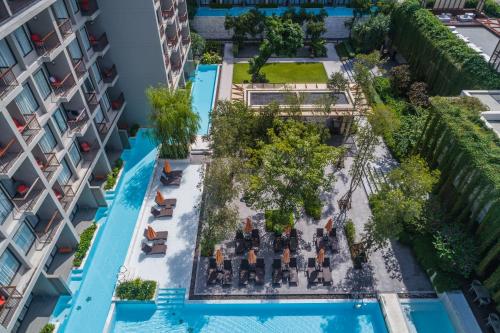 an aerial view of the courtyard of a building at Proud Phuket, Naiyang Beach in Nai Yang Beach