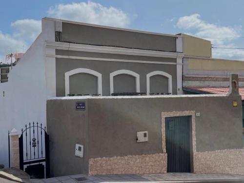 a building with a door on the side of it at Casa Almendra in Santa Cruz de Tenerife