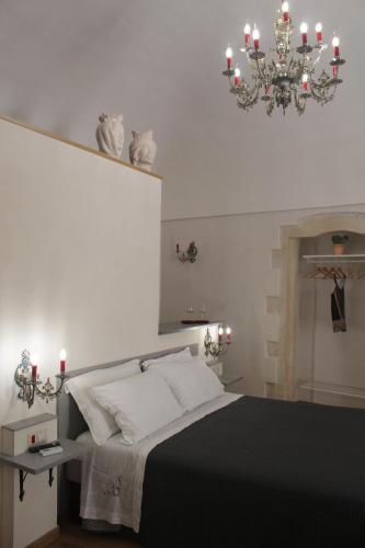 Una cama o camas en una habitación de Terrazza Campailla