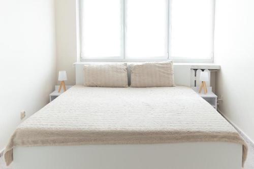 Katil atau katil-katil dalam bilik di Apartament centrum