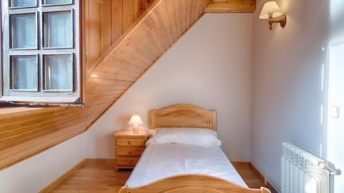 Llit o llits en una habitació de Saplan Real Estate PENSAUETH