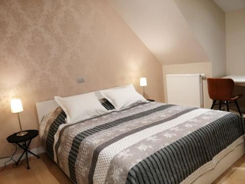 En eller flere senger på et rom på Akkerland - Luxe vakantiehuisje met Infra-Rood sauna - 2 à 6 pers
