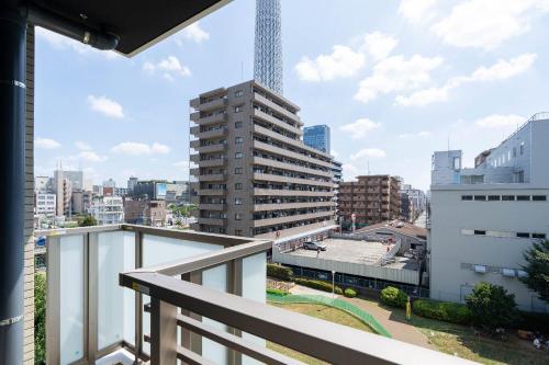 a balcony with a view of a city at Lafesta Higashikomagata in Tokyo