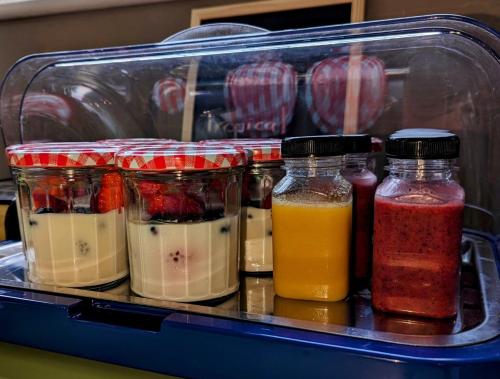 a refrigerator filled with different types of condiments at The Mercury, Blackpool - over 21's only in Blackpool