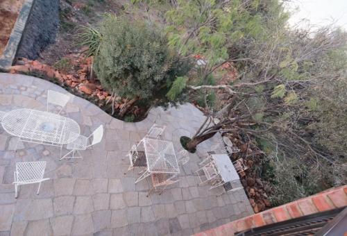 an overhead view of a patio with chairs and a table at Suikerbosrant Sleep and go in Pretoria