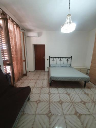 Katil atau katil-katil dalam bilik di Casa Casagiove (CC)