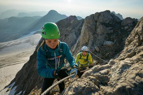 two people on the top of a mountain at Panoramahotel Stocker in Pruggern