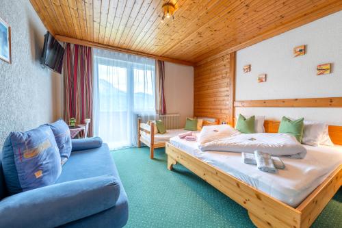 Postel nebo postele na pokoji v ubytování Panoramahotel Stocker