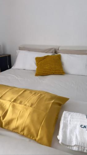 En eller flere senge i et værelse på Cataleya Baia del Carpino Scalea