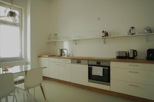 Kuchyň nebo kuchyňský kout v ubytování Apartment Edda