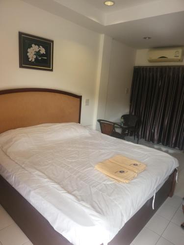 Postel nebo postele na pokoji v ubytování EKALUK PLACE INN