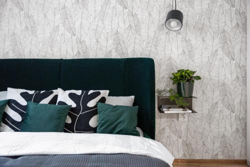Ένα ή περισσότερα κρεβάτια σε δωμάτιο στο Enjoy Downtown Boutique Apartments #13 by Goodnite cz