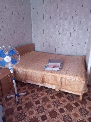 Кровать или кровати в номере Аренда квартир Балхаш