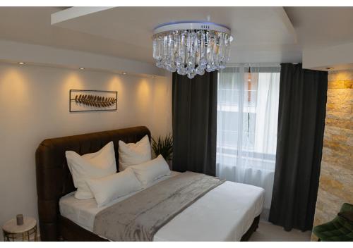 Suites Aix la Chapelle, Exclusive Apartments, Wellness and more, Aachen Cityにあるベッド