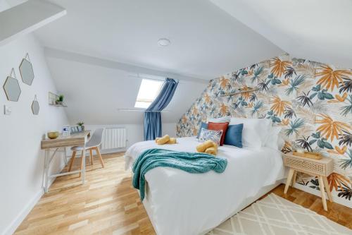 Ένα ή περισσότερα κρεβάτια σε δωμάτιο στο Maison 4 chambres - 12 personnes - Parking Privé - Metro 7 - Rer B -