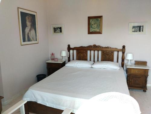 En eller flere senge i et værelse på Family Sea Summer House at Eretria
