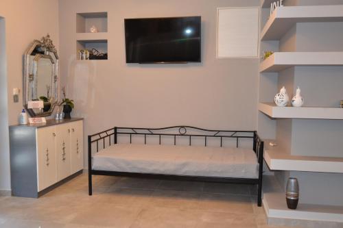 Кровать или кровати в номере Vigla comfort house