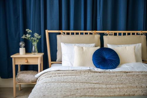 Ένα ή περισσότερα κρεβάτια σε δωμάτιο στο Enjoy Downtown Boutique Apartments #13 by Goodnite cz