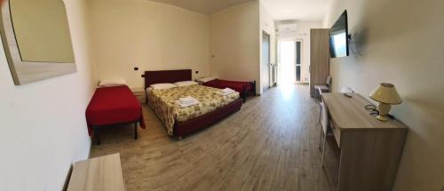 Ένα ή περισσότερα κρεβάτια σε δωμάτιο στο B&B Villa Mery