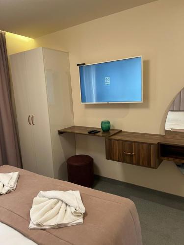 Кровать или кровати в номере Floral Boutique Hotel